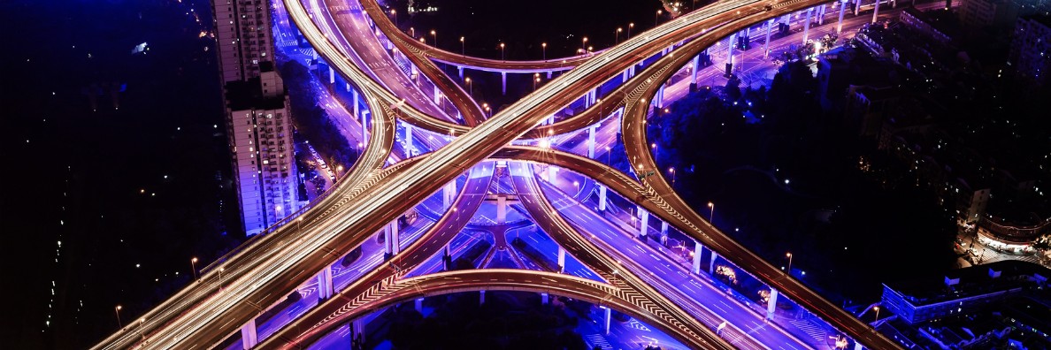 Highway intersection by night.