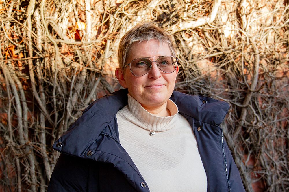 A woman in tinted glasses