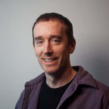 a man in a grey jacket