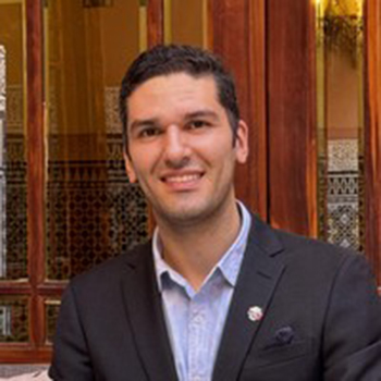 A man in front of a door