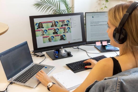 Woman working in an online meeting