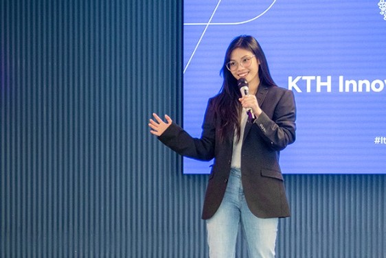 Woman holding a microphone.