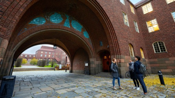 KTH campus with three students