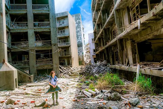 A woman in a city destroyed by war