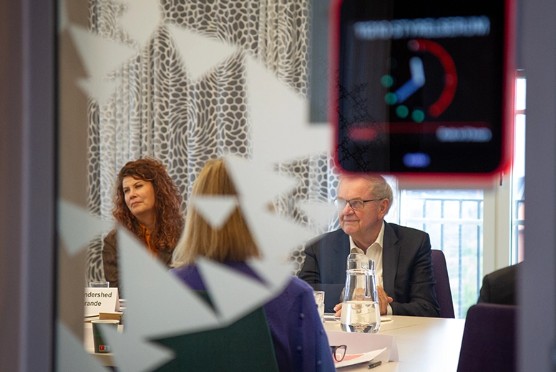 people in meeting room